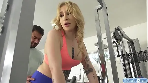 Big Fitness coach seduces TS Angelina Please.He gives her a bj and she deepthroats his cock.He barebacks her and she rides his he anal fucks her warm Tube